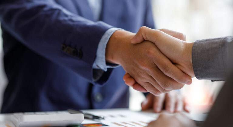 Business to business referral, handshake